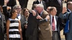 Jim Obergefell and fellow plaintiff Luke Barlowe hug as they exit the Supreme Court on April 28, 2015 after oral arguments concerning whether same-sex marriage is a constitutional right.