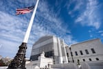 An American flag is seen outside the Supreme Court, in Washington, D.C., in November. This week, the high court will hear oral arguments for a case that could change who gets to be a U.S. citizen.