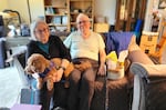 Barbara, left, and Dan Gleason, right, pictured with their dog Aldi in March. The couple said they are no longer able to see their Oregon Medical Group doctor because the system no longer accepts their insurance.