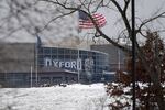 Oxford High School is shown in Oxford, Mich., Tuesday, Nov. 30, 2021, where authorities say a student opened fire at the school. (AP Photo/Paul Sancya)