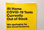 A sign outside a downtown CVS pharmacy alerts customers that home COVID-19 tests are out of stock at the location, Jan. 7, 2022. 