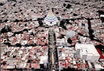 An aerial view from 2023 shows followers of Iglesia La Luz Del Mundo (Light of the World, at center) in the streets of Guadalajara in Jalisco State, Mexico.