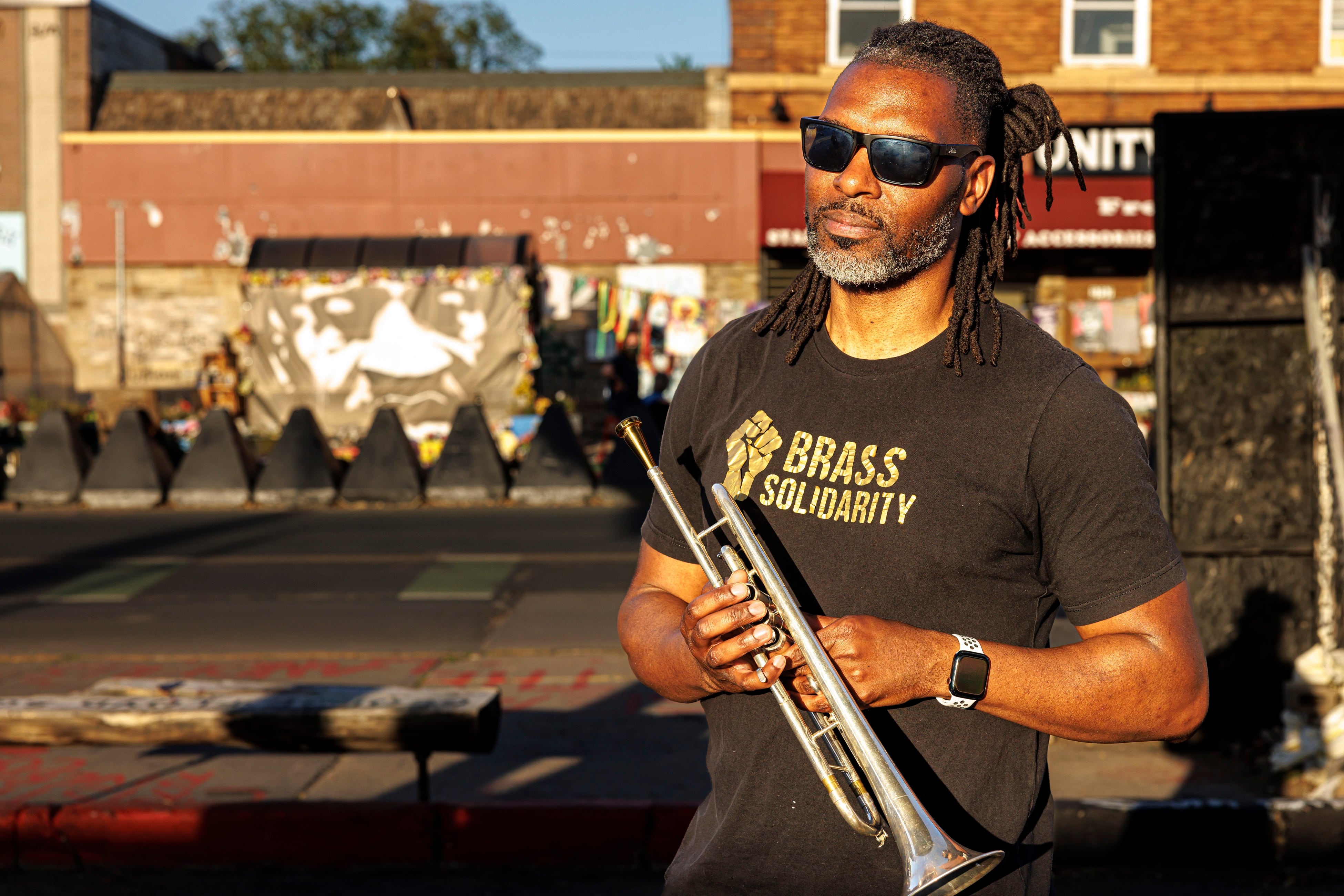 Butchy Austin, one of the musicians who meets weekly at George Floyd Square, says the music they play brings joy and a message of protest.