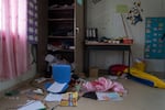 The scene of a classroom that had been attacked in a school in the Mu'ajarat Bedouin Community, Palestine.