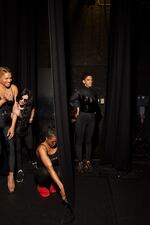 Miss France, Kevhoney Scarlett; Miss Argentina, Lucila Thompson; Miss Nigeria, Alexandra Etim; and Miss South Africa, Chedino Rodriguez Martin, wait to begin practicing their preliminary evening stage walks. Due to countless organizational issues, the contestants were often left to rehearse on their own. Miss Trans Global's busy schedule was thrown off as soon as the pageant started.