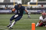 Lake Oswego’s Casey Filkins (9) tries to stay in bounds and score the touchdown. The Central Catholic Rams played the Lake Oswego Lakers at Hillsboro Stadium in Hillsboro, Oregon, on Dec. 7, 2019. The Rams defeated the Lakers 49-28.
