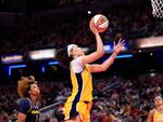 Dearica Hamby of the Los Angeles Sparks attempts a shot during a May 2024 game in Indianapolis, Indiana.
