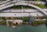 The Vera Katz Eastbank Esplanade, a bicycle and pedestrian path along the east side of the Willamette River, bottom, seen here just north of the Morrison Bridge, March 26, 2024 in Portland, Ore.