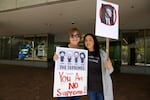 Maureen Rowe Crawford and Lilia Garcia at a rally against Brett Kavanaugh's confirmation to the Supreme Court Sept. 28, 2018. "I want my girls to know just like my sign says: stand up and fight back," Garcia said, referring to her three daughters. "Don't be a doormat."
 