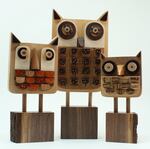 Hilary Pfeifer uses wood pieces salvaged from other artisans to craft whimsical owls. (Undated photo in unspecified location provided by the artist.)