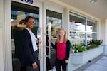 Burgerville's Liz Graham, director of human resources, and Beth Brewer, senior vice president of operations, in front of Burgerville's corporate offices in Vancouver, Washington. 