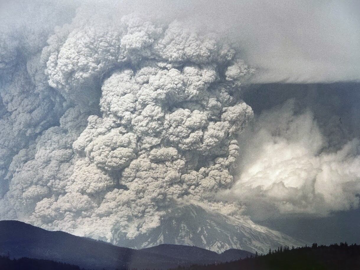 Mount St. Helens erupted at 8:32am, Sunday May 18th, 1980. It exploded sideways first, in a massive lateral pyroclastic blast, then a column of gray ash began to boil upwards, rising as high as 80,000 feet.