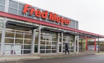 Union members voted late last week to call a temporary strike if necessary as union leaders and representatives from Fred Meyer's parent company, Kroger, began collective bargaining. In this Dec. 17, 2021, file photo, about 4,500 workers are seen at Fred Meyer stores in the Portland area, including the store in Hawthorne in southeast Portland. 