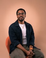 In this photo provided by the City of Bend, Andrés Portela III., sits for a portrait. Portela III., resigned from his role as the City of Bend's Equity and Inclusion Director on Sept. 11, 2025, after two years. Photo courtesy Eduardo Romero.