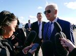 President Biden speaks to reporters before boarding Air Force One in Kentucky on Wednesday. Biden told reporters he plans to visit the southern U.S. border next week.
