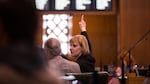 House Majority Leader Jennifer Williamson, D-Portland, signals her vote on the House floor at the Capitol in Salem, Ore., Tuesday, April 2, 2019.