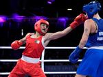 Algeria's Imane Khelif (left) hits Hungary's Anna Hamori in their women's 66kg quarterfinal boxing match at the 2024 Summer Olympics on Saturday in Paris.