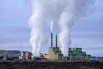 FILE - Steam billows from a coal-fired power plant Nov. 18, 2021, in Craig, Colo.