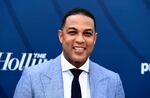 Don Lemon, wearing a light blue suit jacket, white collared shirt and black tie, arrives at THR's Empowerment in Entertainment Gala at Milk Studios, April 30, 2019, in Los Angeles.