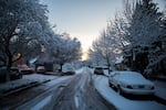 A side street in Southeast Portland is dusted with a few inches of snow and crusted over with ice on the morning of Wednesday, Feb. 21, 2018.