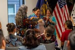 Valeria Atenacio, citizen of the Confederated Tribes of Grand Ronde, an adjunct professor at Portland State University, was gifted a scarf as a way to say thank you for giving Auntie’s Place its Chinook name: khwat yaka haws.