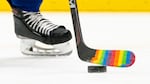 Pride Tape was quickly adopted by NHL teams as a way to support and celebrate LGBTQ+ fans and athletes. But the NHL has banned the tape. Here, a player used the tape on their stick for a pre-game warm up to celebrate a "Hockey is for Everyone" night in March 2021.