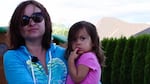 Jennifer Garcia with her daughter, Hannah, 2. Garcia found out the soil in her yard tested high for arsenic. It’s left over from pesticides sprayed before the 1950s on this same piece of land, when it was an orchard.