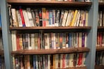 Books line the shelves of the library at NORCOR.