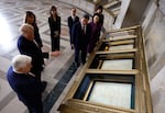 U.S. President Donald Trump (2nd-L) speaks to Archivist of the United States Bradford Wilson (L) as he views the U.S. Constitution during a tour of the National Archives Museum alongside first lady Melania Trump, President of China Xi Jinping and first lady of China Peng Liyuan on September 25, 2026 in Washington, DC.