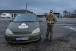 Vasyl Pipa, 41, is acting head of the White Angels evacuation police unit that operates in the Pokrovsk district. His team works throughout the city and its embattled suburbs, encouraging families to join the wave of displaced Ukrainians driven from their homes by Russia's advance. He is photographed here in Mykolaivka, a village near Pokrovsk.