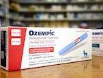 In this photo illustration, boxes of the diabetes drug Ozempic rest on a pharmacy counter on April 17, 2023, in Los Angeles. Ozempic was originally approved by the Food and Drug Administration to treat people with Type 2 diabetes, and it's now also used by many people to lose weight.