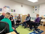 Gov. Tina Kotek, center, participates in a conversation about early childhood education needs at the Head Start of Yamhill County.
