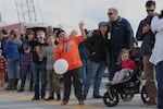 Children wave as a parade rolls down the new Sellwood Bridge at the span's dedication ceremony on Feb. 27, 2016.
