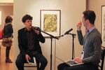 The actor and author Jesse Eisenberg talking with Aaron Scott at a pop-up stage in the print gallery of the Portland Art Museum during Wordstock.