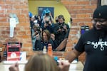 Vice President Harris sits in the “lucky chair” at Philly Cuts on Oct. 27, 2024, in Philadelphia. According to the barbershop, anybody that has run for office and has sat in that chair has won.