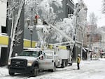 TriMet works to fix a line in downtown Portland, Jan. 11, 2017.