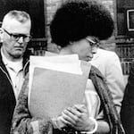 Joanne Chesimard, who used the name Assata Shakur and was a member of the Black Panther Party and Black Liberation Army, leaves Middlesex County courthouse, in New Brunswick, N.J., April 25, 1977. (AP Photo/File)