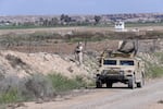 A soldier from the U.S.-led coalition is seen at the Al-Qaim Military Base in Iraq's Anbar province, west of Baghdad, on March 19, 2020.