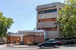 Plywood covers the windows and doors at the U.S. Immigration and Customs Enforcement building in Portland, Ore., June 17, 2025. 