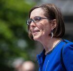 Oregon Gov. Kate Brown spoke to the public at the 2015 Armed Forces Commemoration outside the capitol building in Salem on Thursday, May 14, 2015.