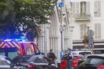 French policemen stand next to Notre Dame church after a knife attack, in Nice, France, Thursday, Oct. 29, 2020. French anti-terrorism prosecutors are investigating a knife attack at a church in the Mediterranean city of Nice that killed two people and injured several others.