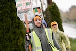 Justin Brown (foreground) said he was one of four workers who was fired after initiating the process to form a union at the Gresham, Ore., cannabis grow location of CBN Holdings. “The timing of it was very suspicious,” Brown said.