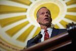 Senate Majority Leader John Thune, R-S.D., speaks to reporters at the U.S. Capitol on Tuesday. Senate Republicans have unveiled a budget blueprint they hope to pass as they look to enact key elements of President Trump's domestic policy agenda.