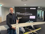 Quantum Systems’ chief sales officer, Martin Karkour, holds one of his company’s bestselling drones, the Vector, at the company’s headquarters outside Munich.