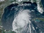 This GOES-16 GeoColor satellite image taken at 4:16 p.m. EDT on Friday and provided by NOAA, shows Hurricane Beryl over Mexico’s Yucatan Peninsula.