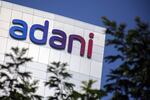 A sign atop the Adani Group headquarters in Ahmedabad, India, on Wednesday. The crisis of confidence plaguing Gautam Adani is deepening, with the stock rout triggered by Hindenburg Research's fraud allegations erasing a third of the market value in his group's companies despite the completion of a key share sale.