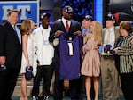 Members of the Tuohy family are speaking out after former NFL player Michael Oher alleged that they earned millions from pushing a false narrative that they adopted him. Here, Oher poses for a photograph with the Tuohy family at Radio City Music Hall for the 2009 NFL Draft on April 25, 2009 in New York City.