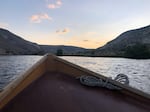 Sunrise on the Deschutes River as Jerry Christensen, aka "Two-ply," begins his weekly trip to clean the outhouses along Oregon's lower Deschutes River.