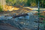 After: A new bridge at that same former undersized road-stream crossing, Olympic National Forest.