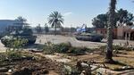 This photo provided by the Israel Defense Forces shows a tank with an Israel flag on it entering the Gazan side of the Rafah border crossing on Tuesday.